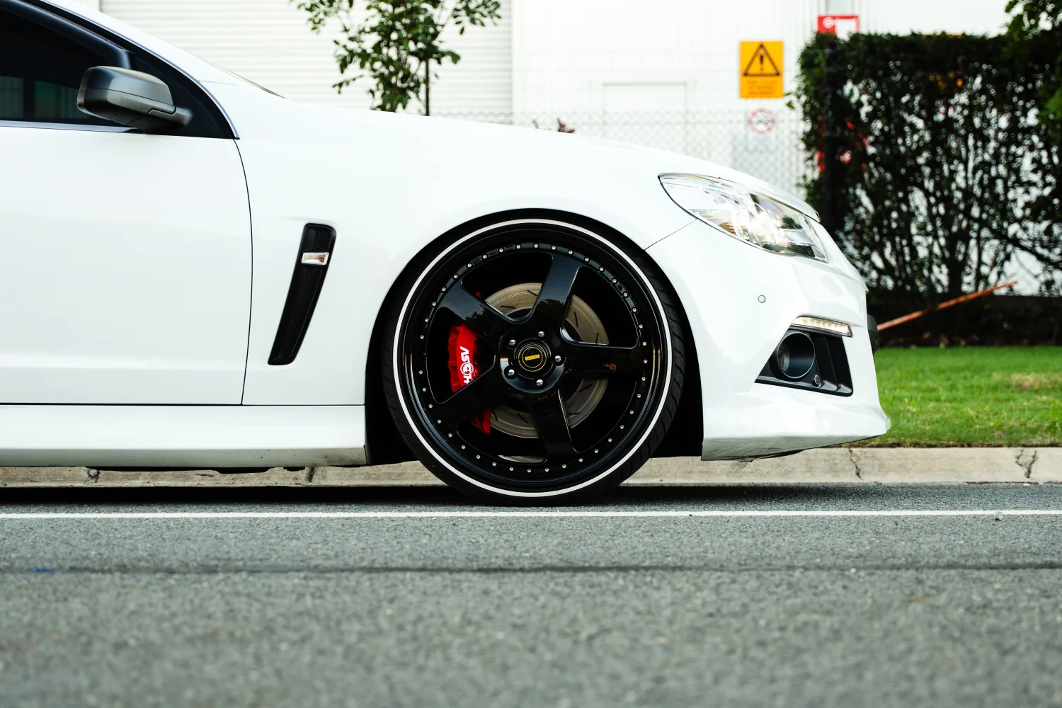 HSV GTS ClubSport front quarter, slammed stance on forged wheels.