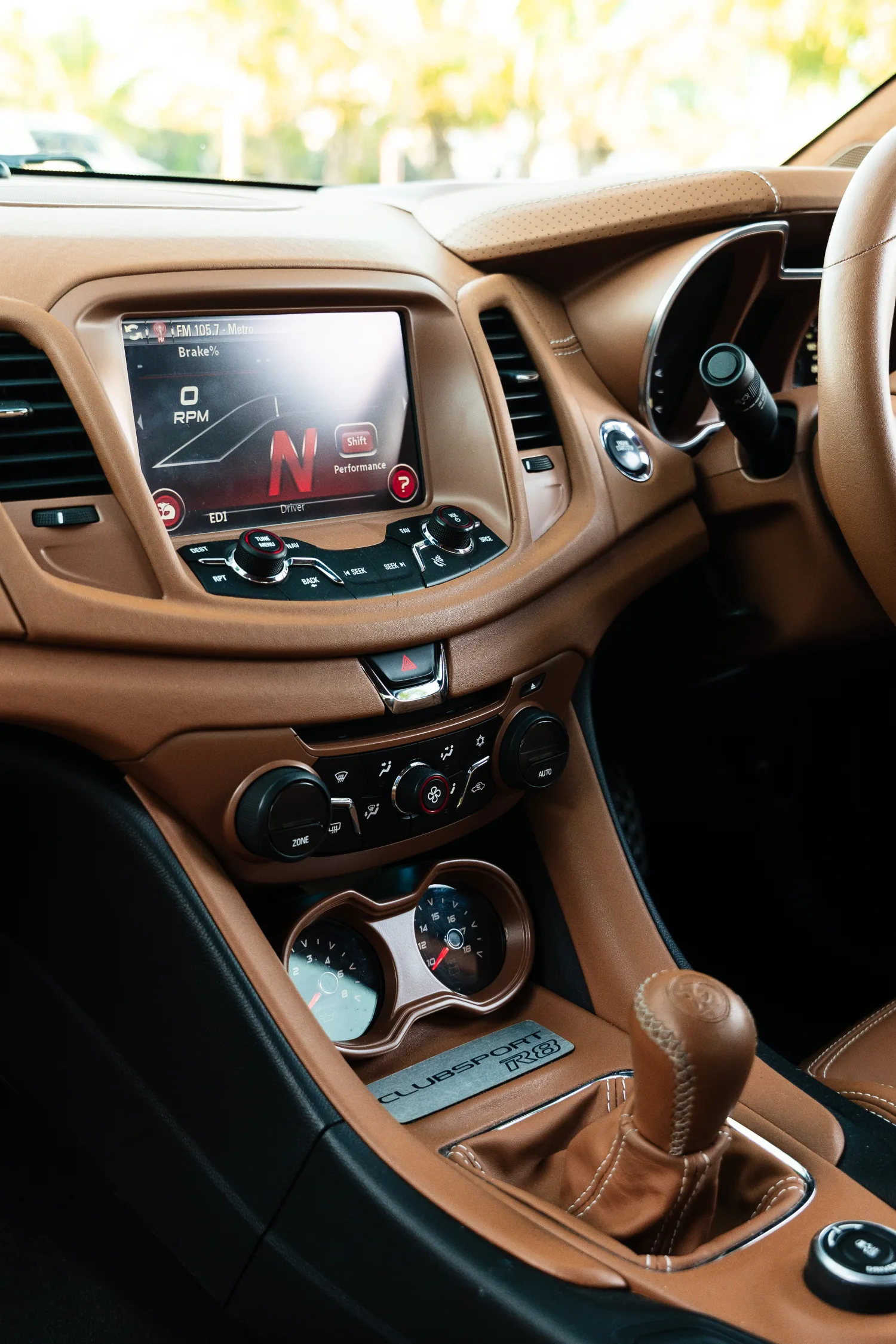 HSV GTS tan leather centre console, infotainment and shifter detail.
